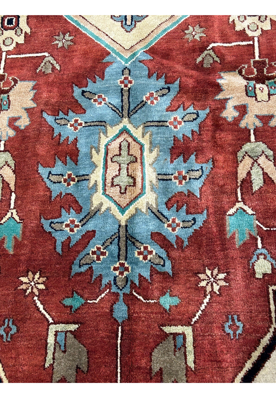 Close-up of patterns on the 14 x 24 Beige Red Oriental Serapi Rug highlighting intricate details.