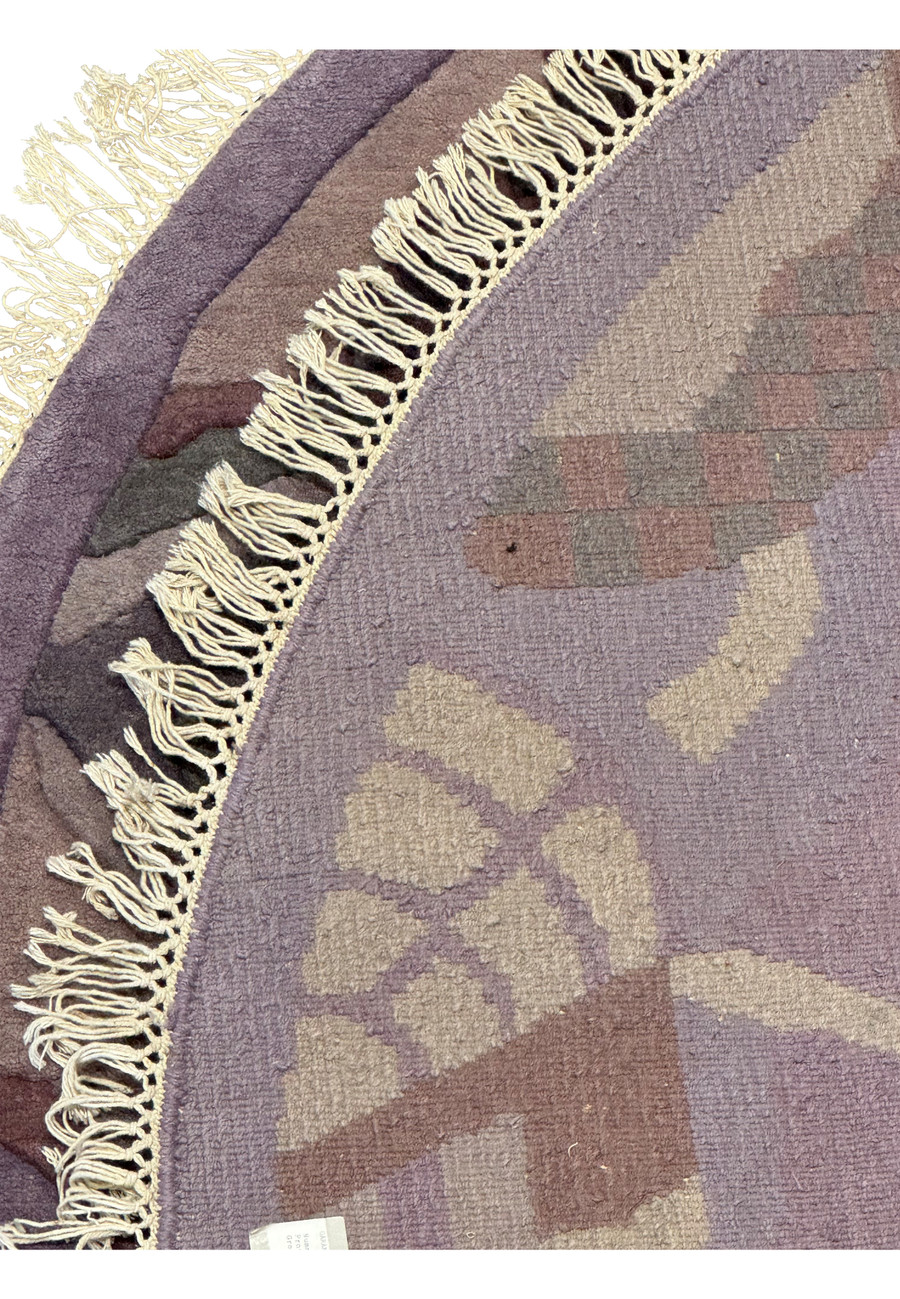 Backside of the 7'3 x 7'3 Nepali Art Deco Round Rug, revealing the fine cotton foundation and hand-knotting technique.