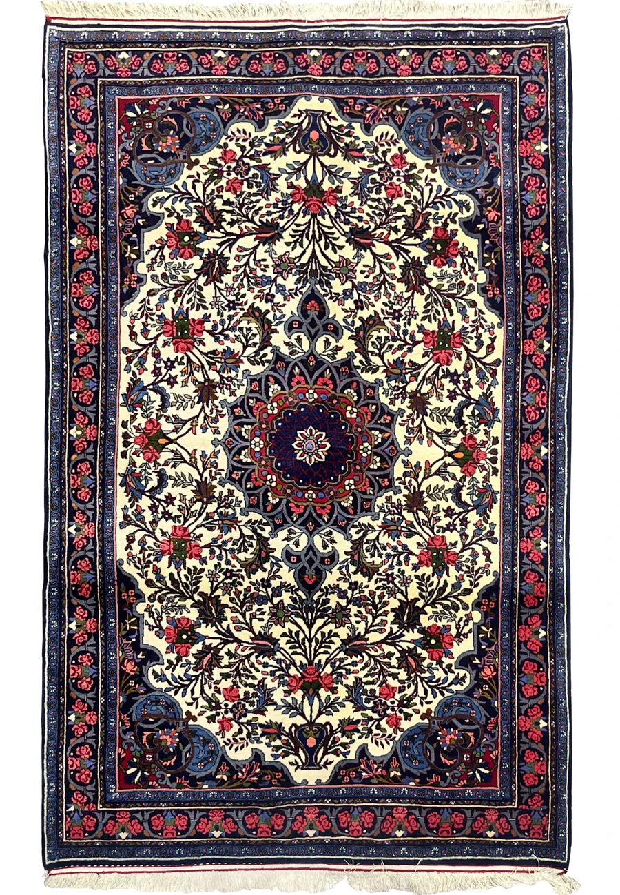 Ivory field floral Persian Bijar with rose filled navy borders and central medallion