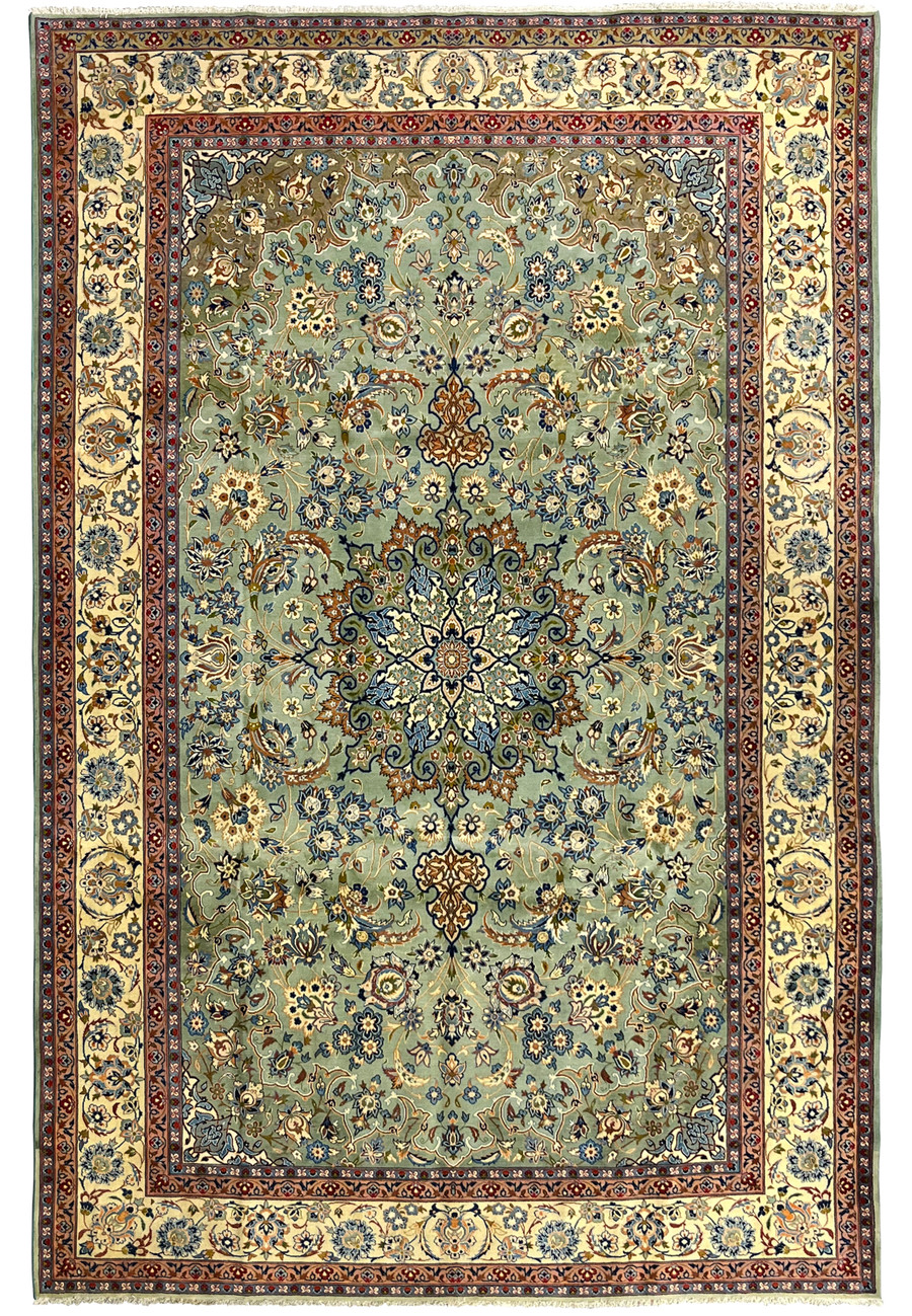 Full view of 9'4 x 14'5 Persian Tabriz rug with light sage-green field and ivory floral border