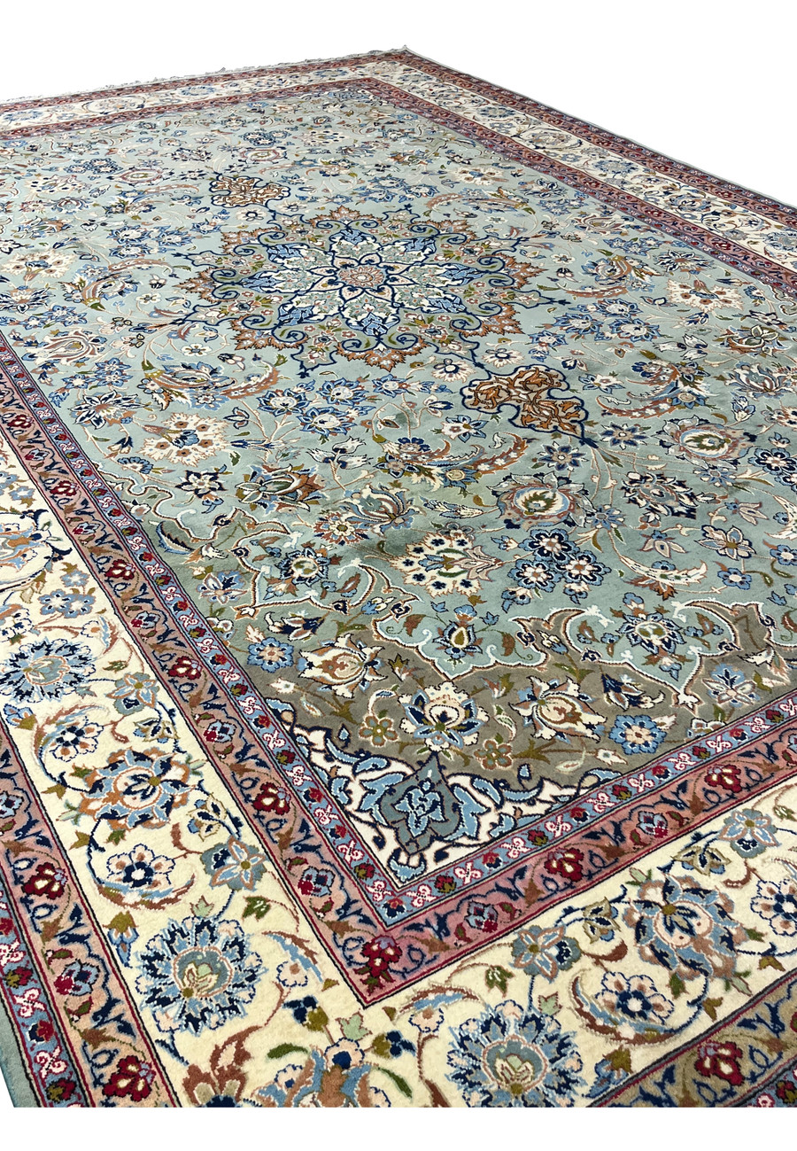 Angled perspective showing depth and sheen of the Persian Tabriz wool pile