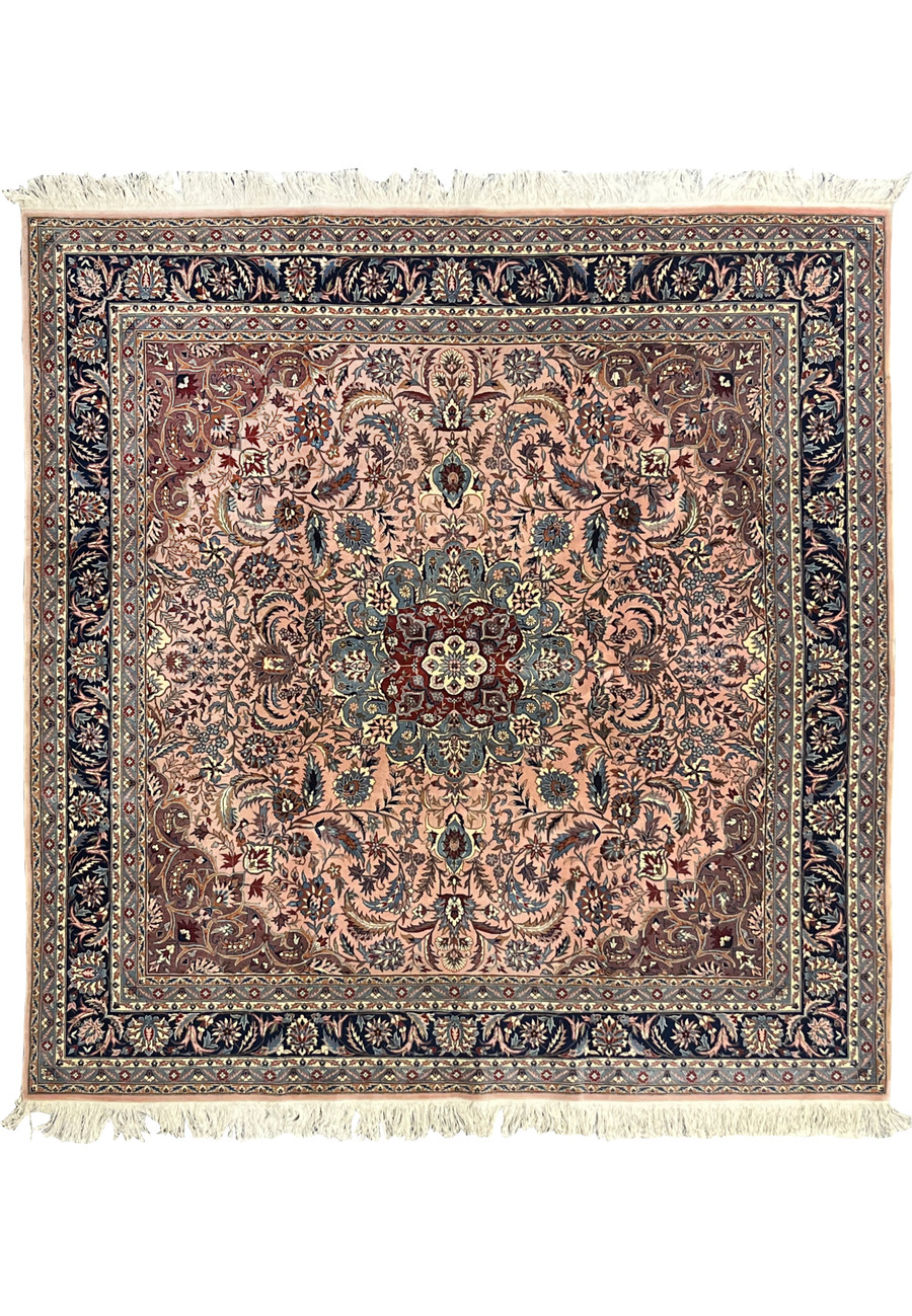 Full view of 8'2 x 8'2 Persian Tabriz square rug with salmon field, navy border, and detailed floral medallion