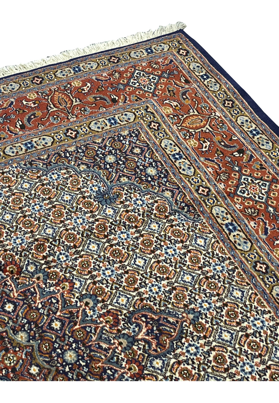 Upper edge view showing the transition from the red floral border to the ivory center, accentuating the precise pattern alignment and vivid color harmony.