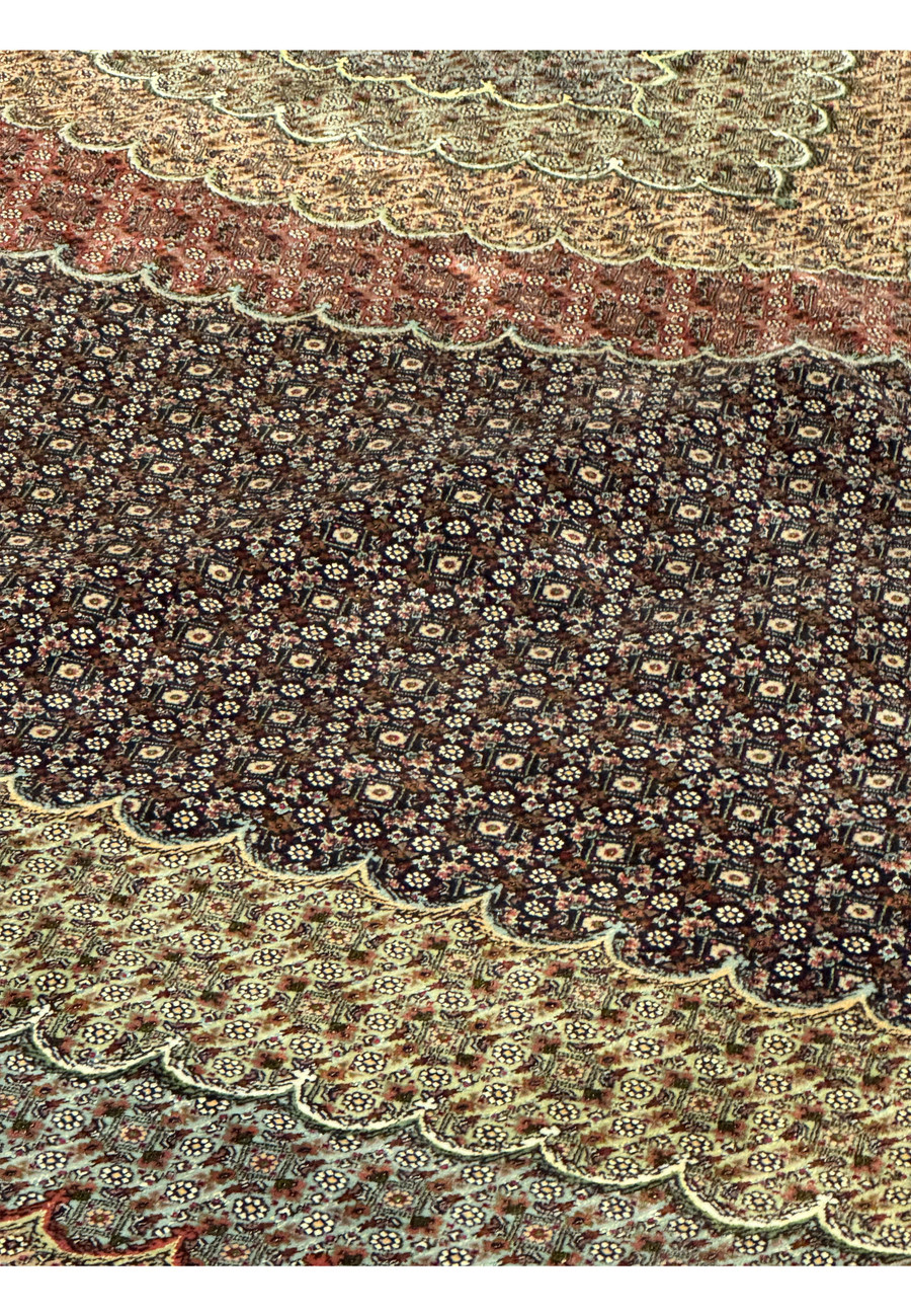 Close up of classic Mahi herati pattern in Persian Tabriz 50 Raj rug showing fine scale repetition and exceptional knot precision