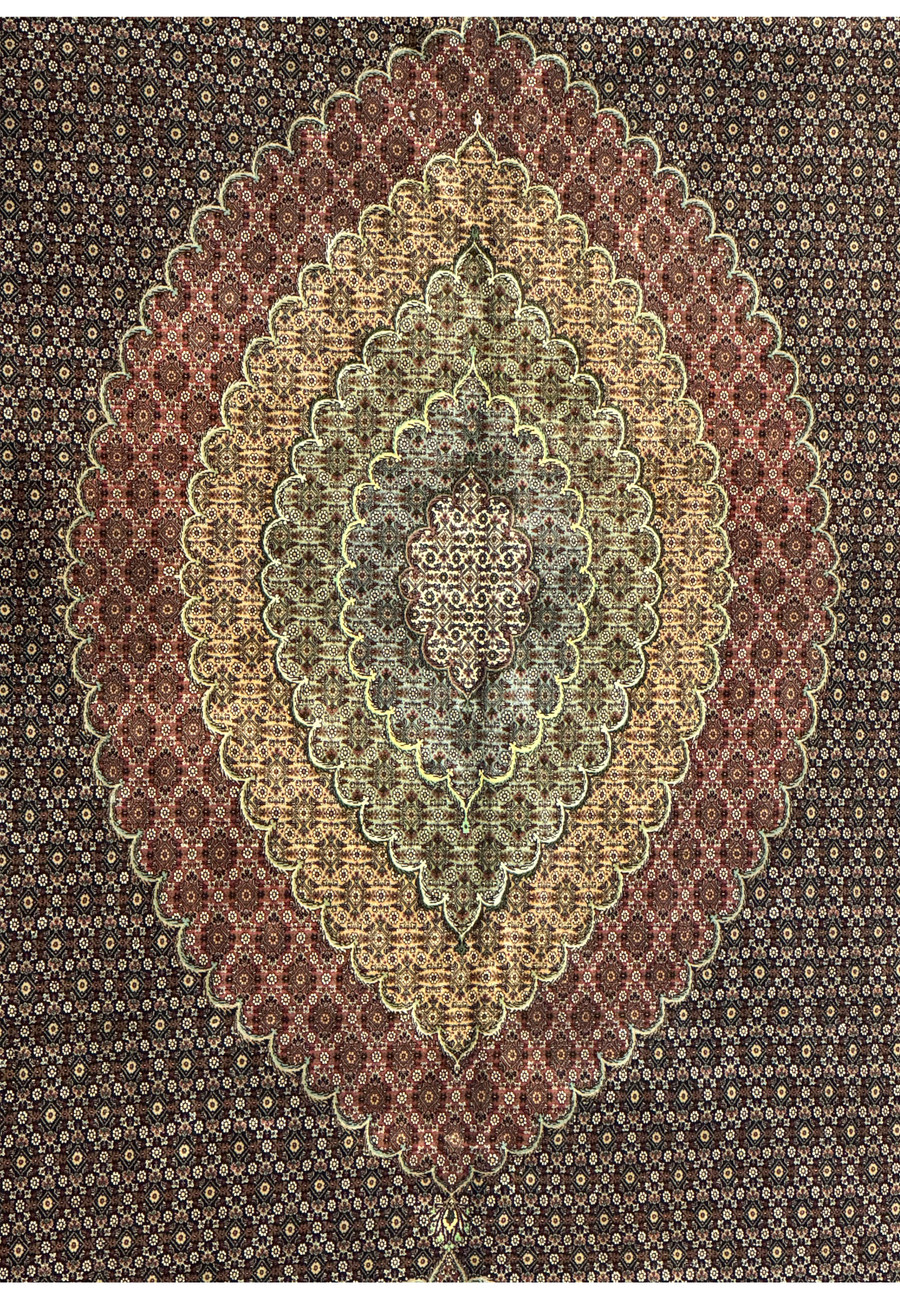 Close up of the central layered diamond medallion in a Persian Tabriz Mahi 50 Raj rug, revealing fine knot density and precise floral geometry