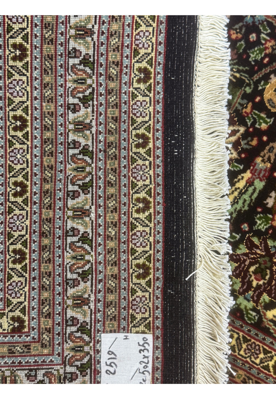 Full backside view of an 11.5 x 16.5 Persian Tabriz Mahi 50 Raj rug displaying uniform knot structure, sharp motif definition, and high quality hand knotted construction