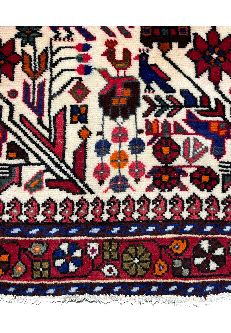 3'5 x 5 Persian Rudba showing lower border and part of the all over midfield highlighting tribal authentic design.