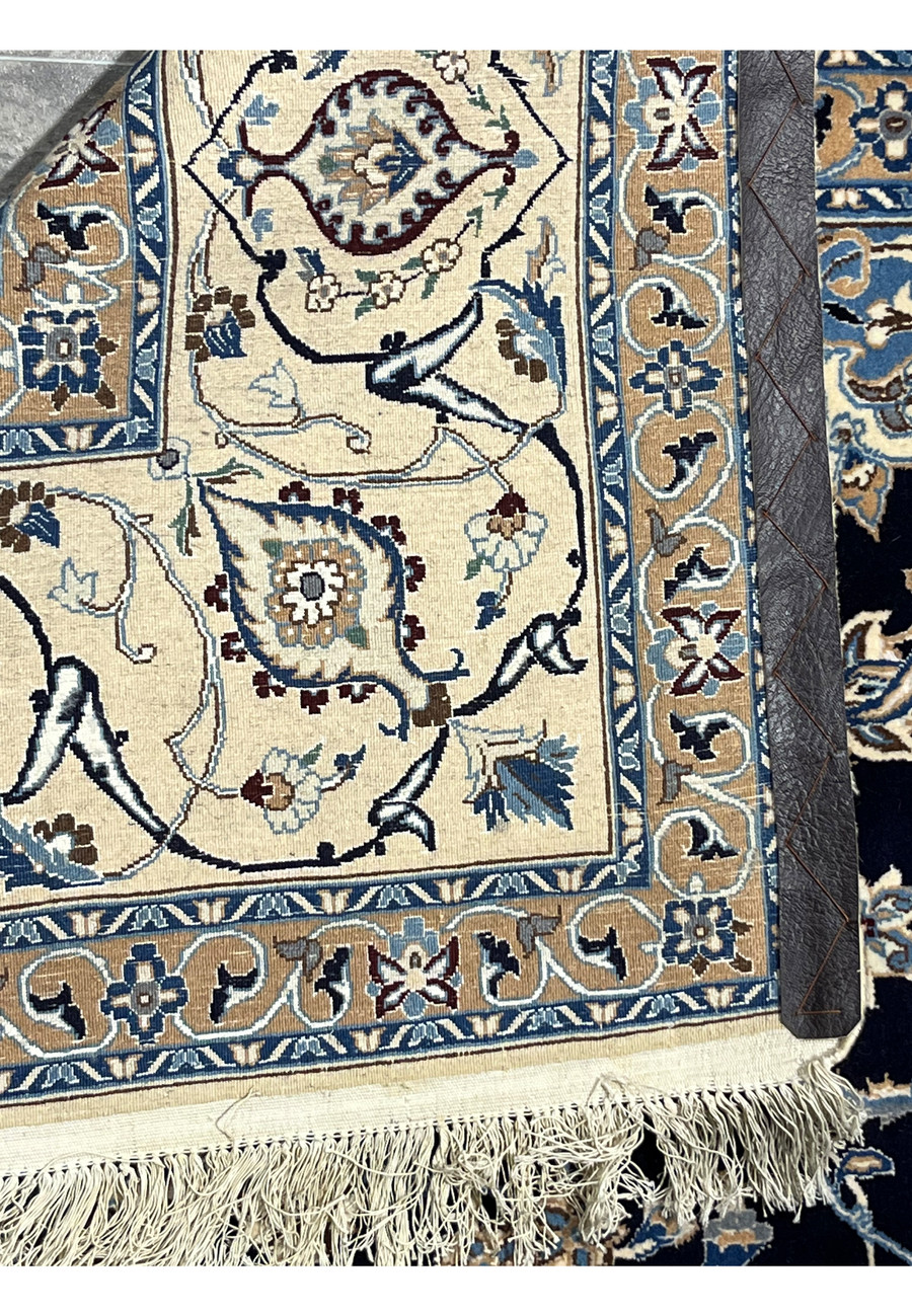 Backside view of a Persian Nain 6 LA rug illustrating tight knot work, balanced weave, and consistent structure typical of fine Nain rugs