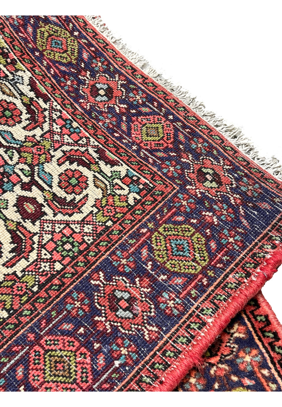 Backside of hand-knotted Persian Gholtogh rug displaying tight knot structure and authentic village craftsmanship
