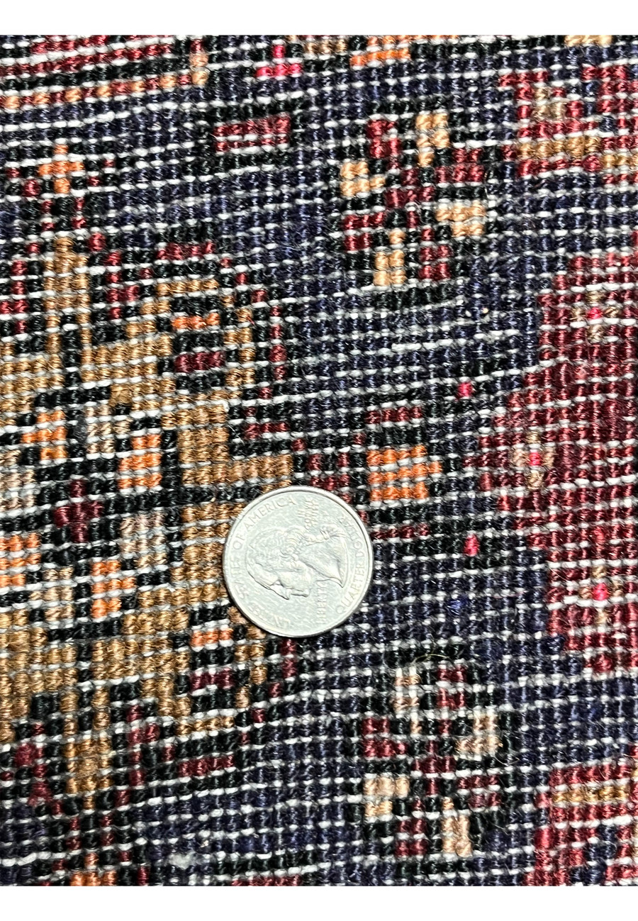 Close view of the backside of a Persian Gholtogh rug with measured knot density, even hand-knotting, visible structure, and durable wool construction