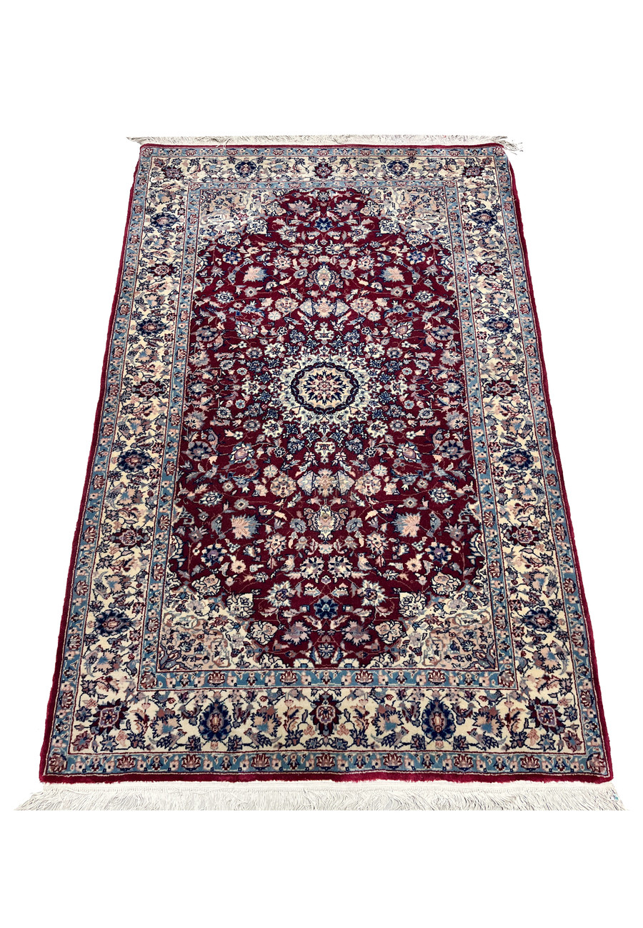 Hand knotted 3' x 5'3 Persian Tabriz rug with burgundy field, classic medallion design, ivory floral motifs, and detailed border shown laid flat
