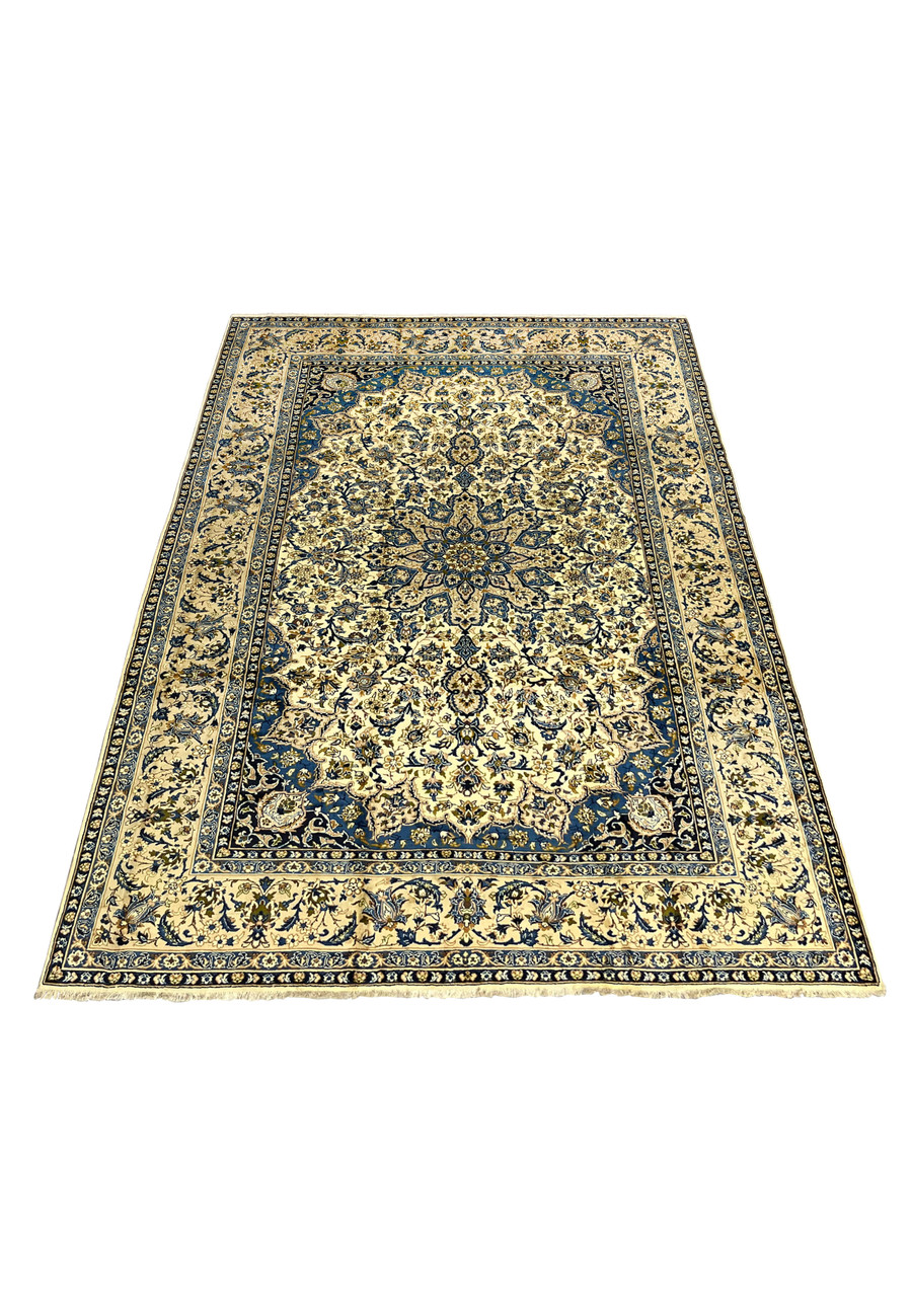 Large 10'2 x 14'3 Persian Kashan rug laid down showing ivory floral field deep navy border and symmetrical medallion design