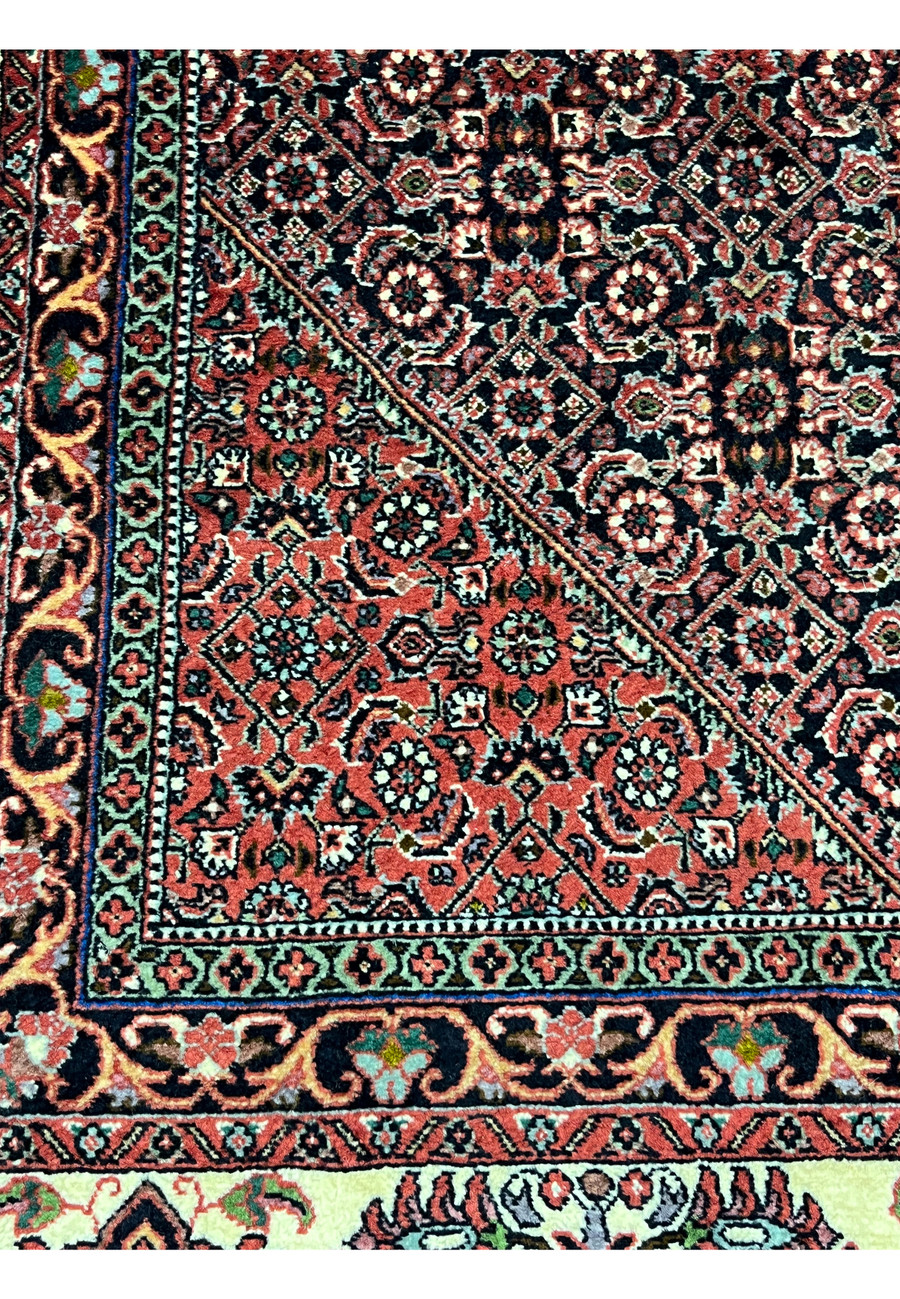 Detailed inner border of 8'2 x 11'4 Persian Bijar Iron Rug highlighting fine knot work, ivory accents and classic Bijar iron weave structure