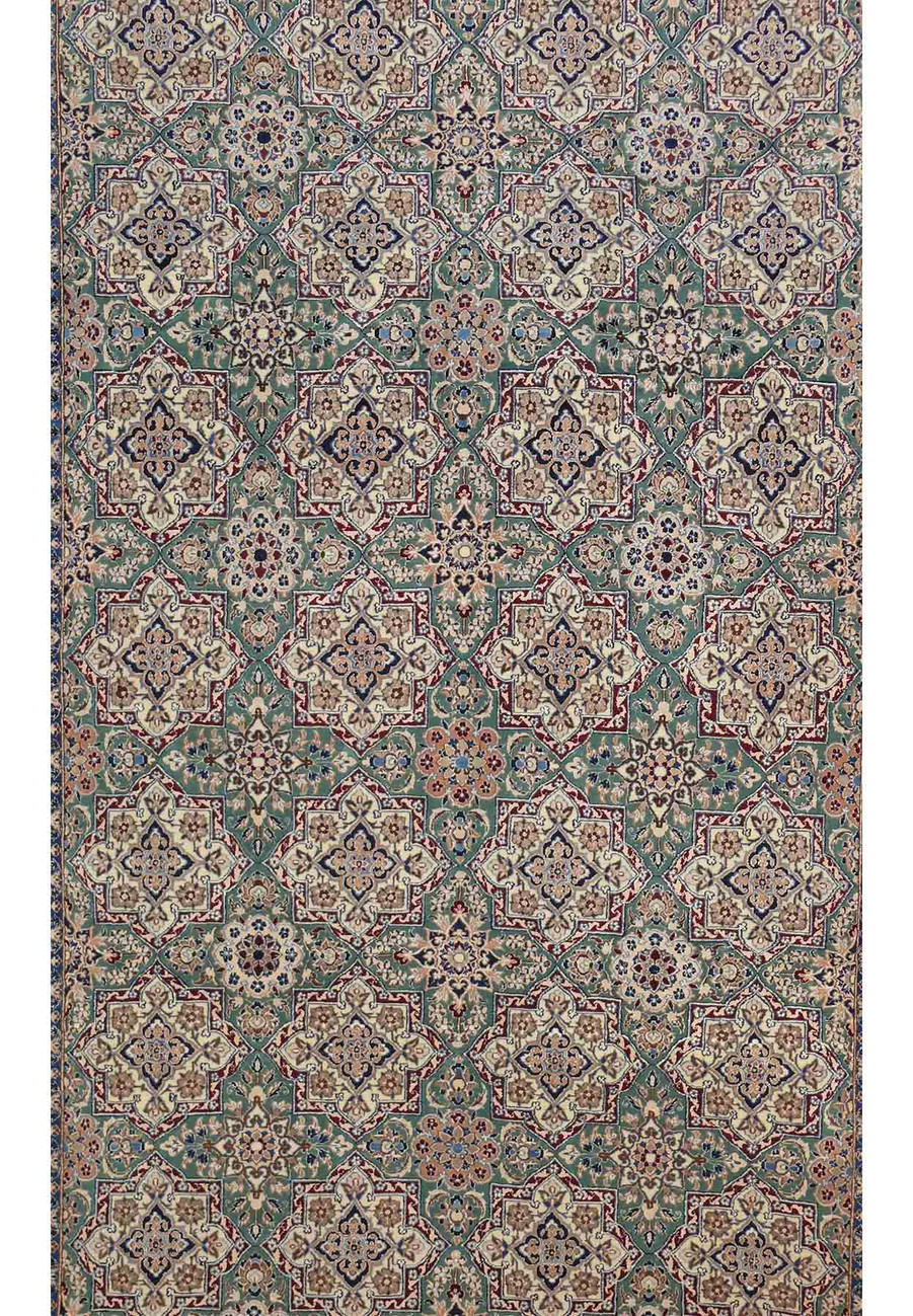 Close up of the intricate floral designs and arabesques on the 6'8 x 10'1 Persian Nain 6 LAA Habibian rug showing the distinctive ivory ground with indigo blue and soft gold silk highlights