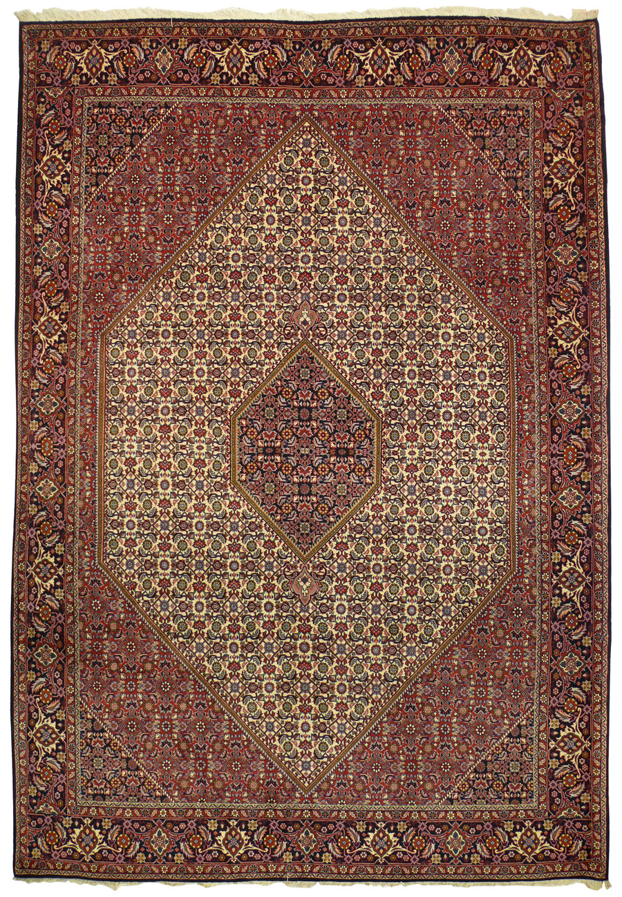 Stepped diamond medallion on ivory herati ground framed by a navy floral border