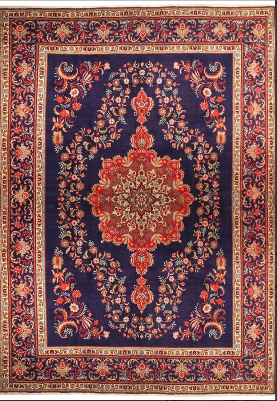 10x13 Persian Tabriz rug with red floral medallion on open midnight navy field for colonial living room