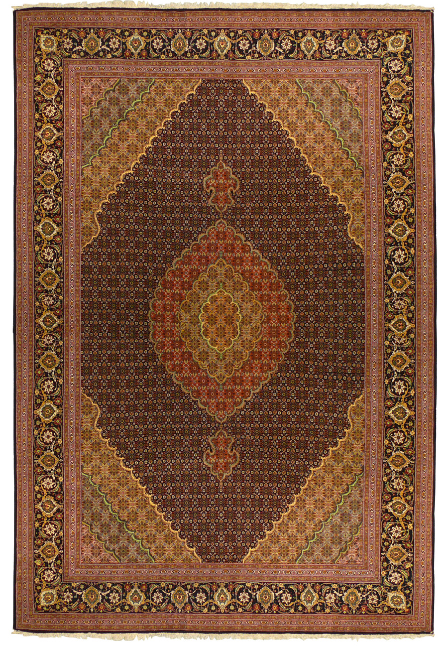 Persian Tabriz Mahi rug in wool and silk with navy fish design field and rust medallion