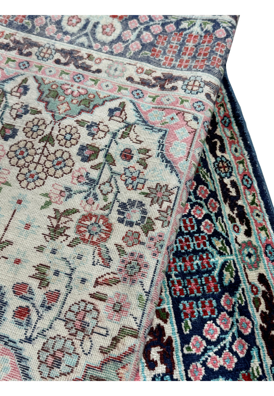 Back view of a 3 x 5 Persian Qum Silk Rug, showcasing the craftsmanship and knotting technique.