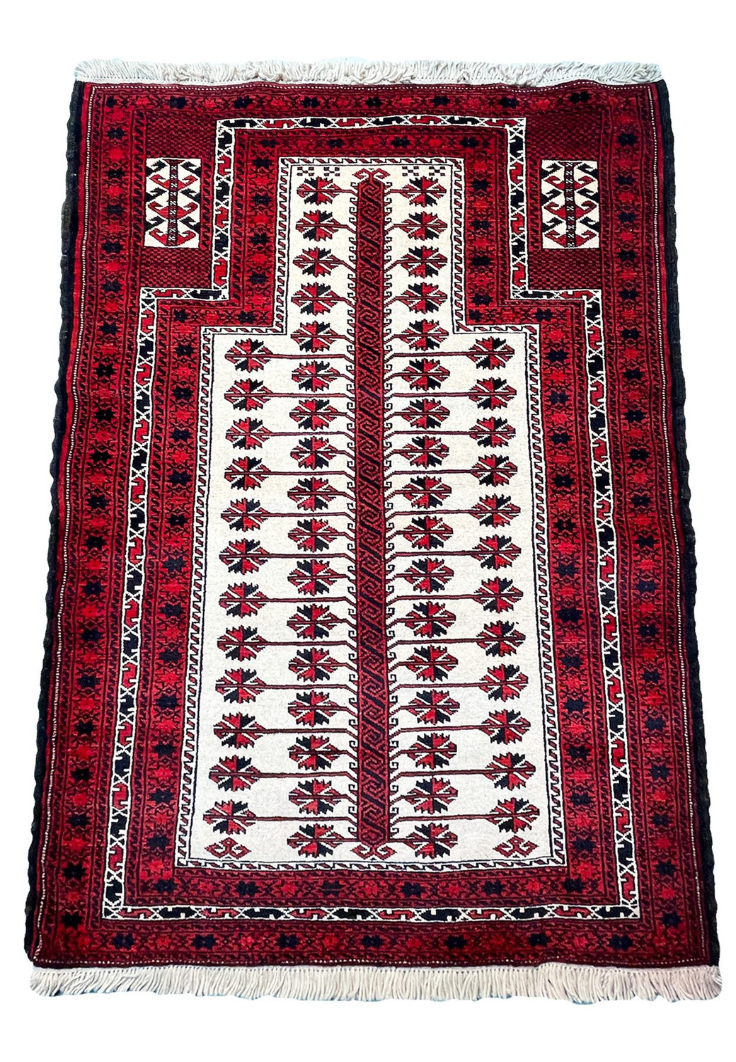 Persian Baluch rug with a mesmerizing burst of color and intricate patterns, perfect for adding a touch of elegance to any room.