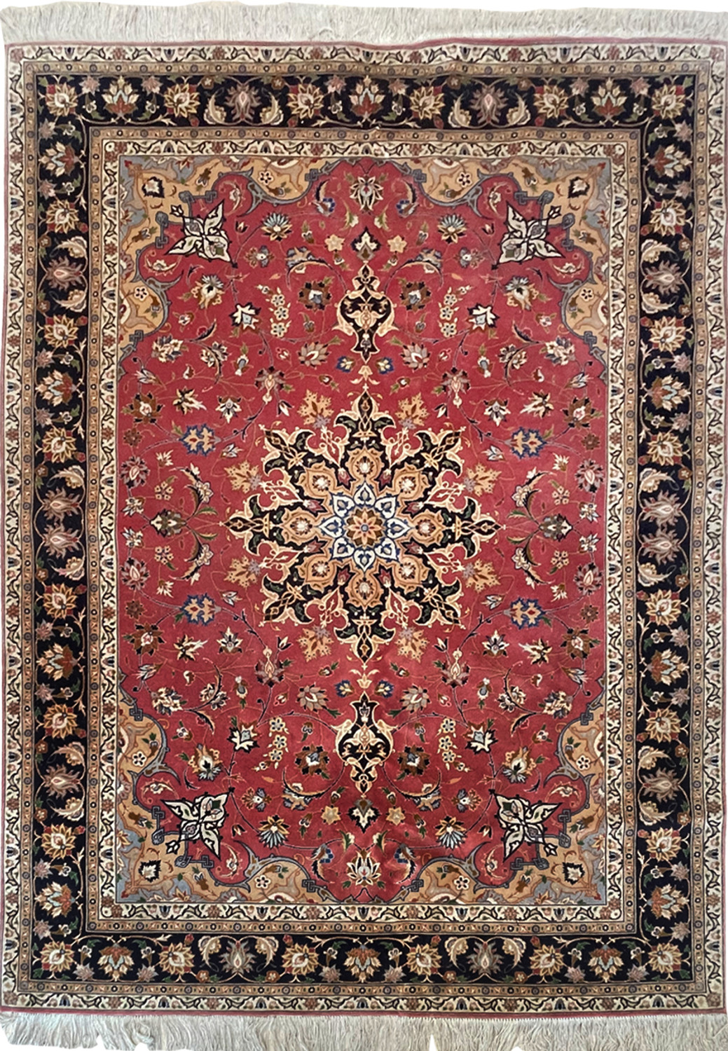 Elegant 5x7 Persian Tabriz Rug with Salmon and Navy Blue Hues on Display