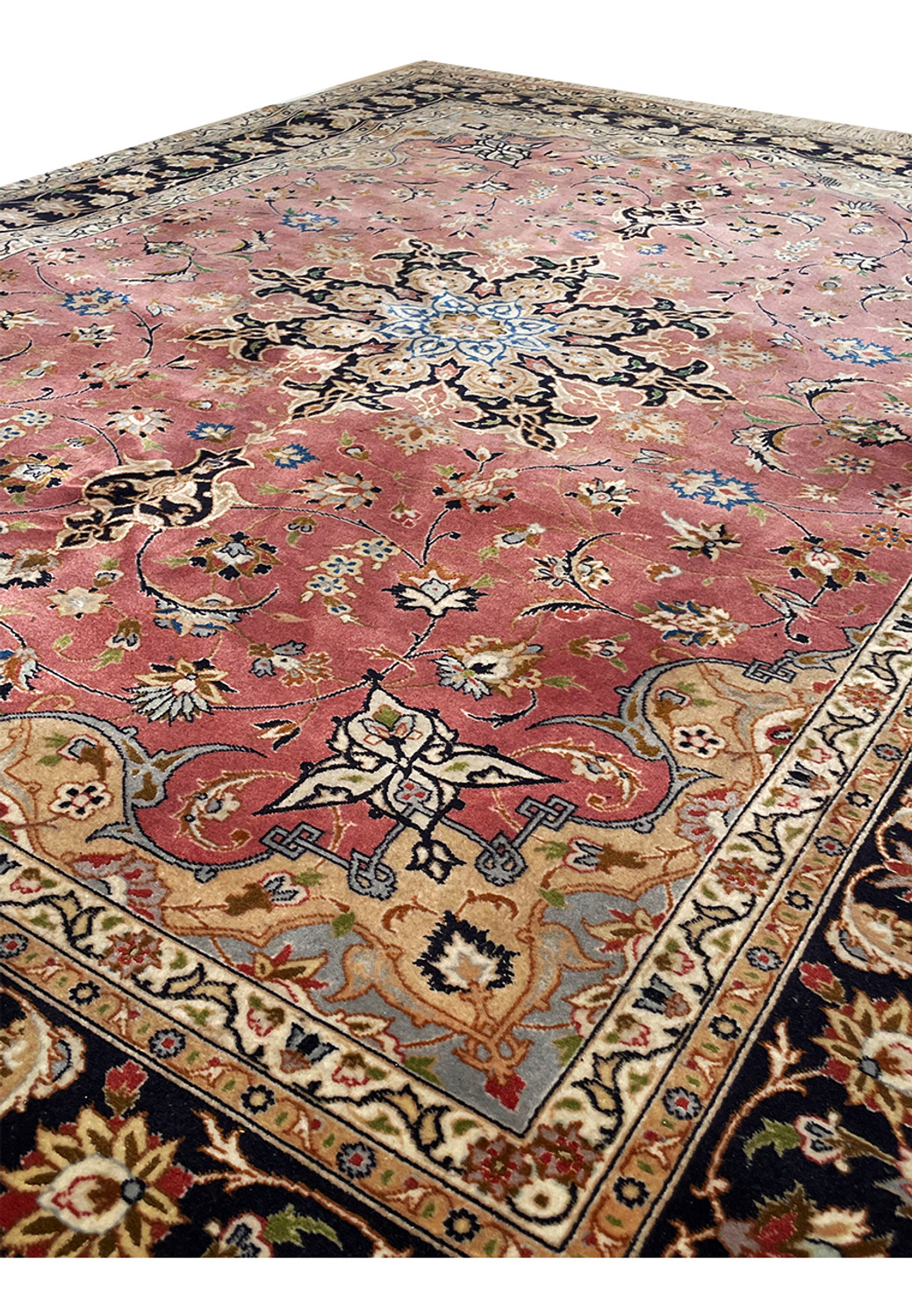 Expert Craftsmanship Revealed in the Tight Knots of a Persian Tabriz Rug