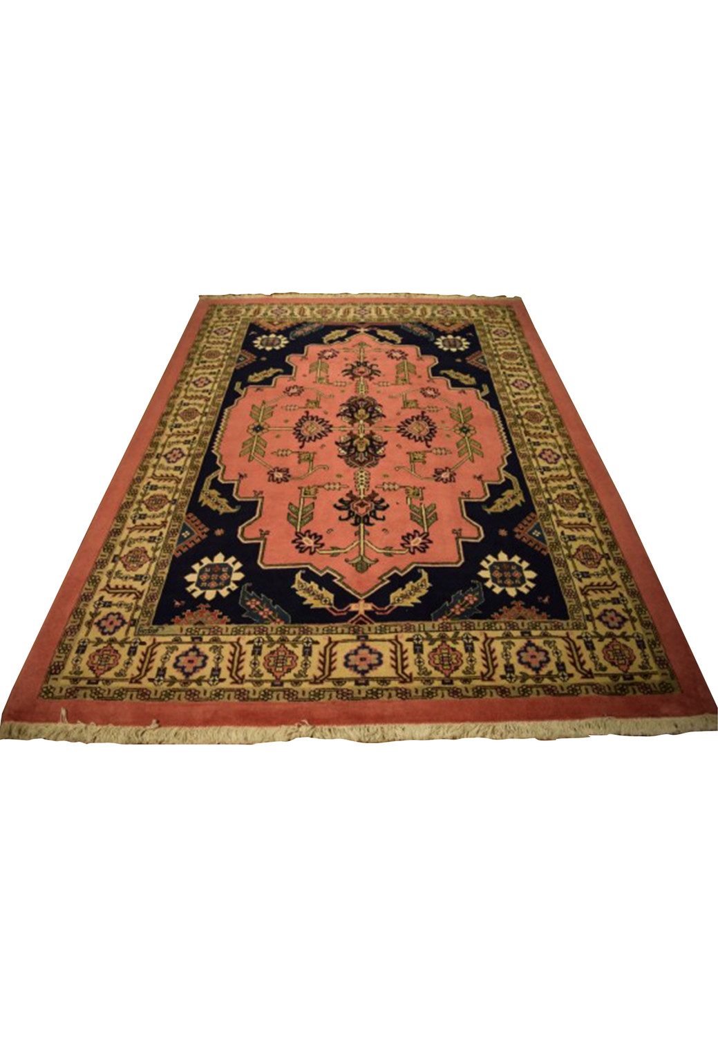 Full view of a Persian Tabriz rug laid out, showcasing its elegant floral design and distinctive color palette