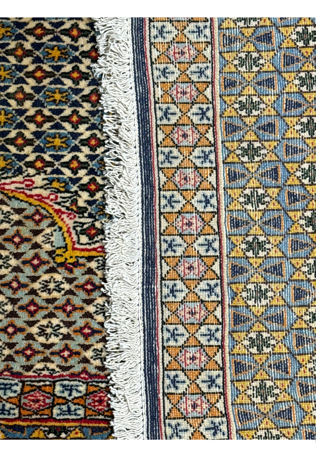 Lush fringe detail of Persian Qum Rug, exemplifying luxury kork and silk blend