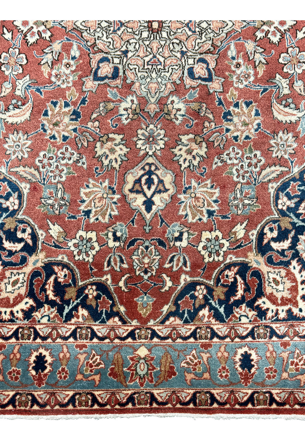 Close-up of intricate floral patterns on a 3x5 Antique Mashad Rug, showcasing the fine craftsmanship and rich colors