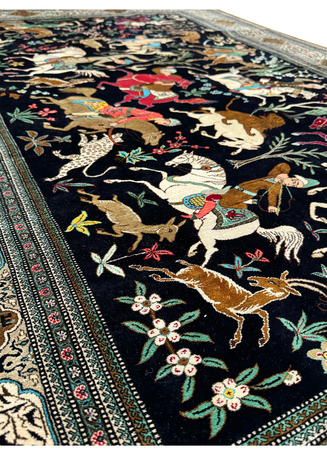 Longitudinal view of Persian Qum Silk Hunting Rug showing the full flow of the hunting scene and parallel border design