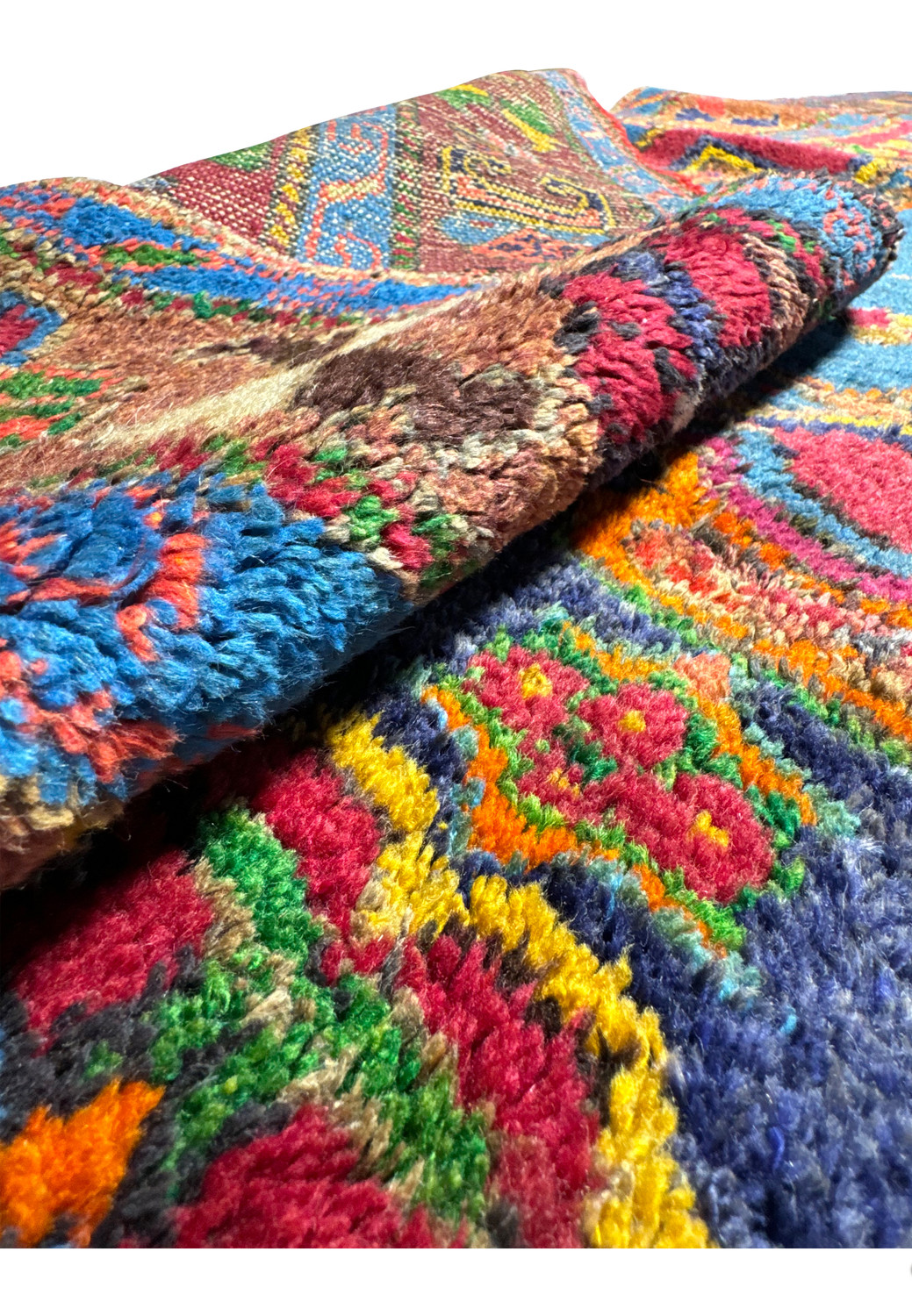 Close-up texture detail of a Russian Kazak rug, highlighting the intricate craftsmanship and rich colors of the hand-knotted wool fibers, with vibrant hues of blue, red, green, and yellow creating a detailed pattern