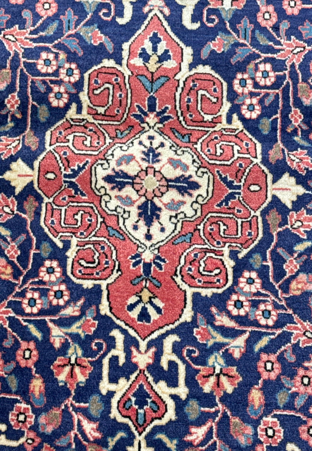 Detailed view of the floral motifs and patterns of a Vintage Persian Sarough Rug, highlighting the fine craftsmanship