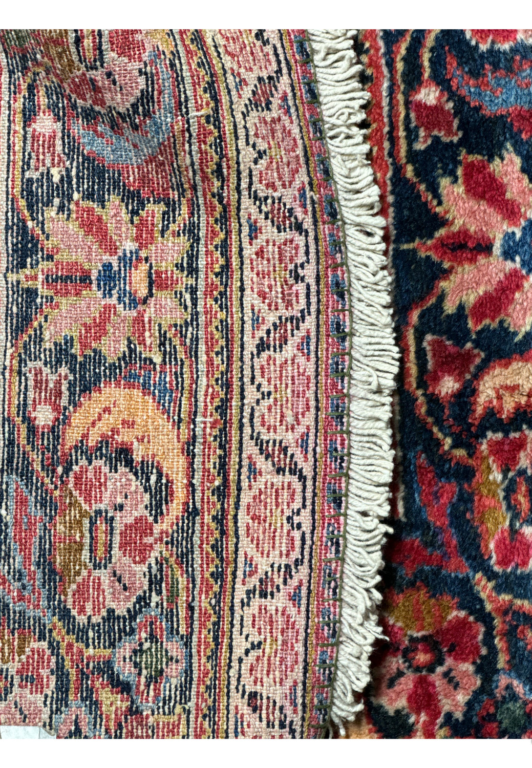 Close-up of the fringe of a 4x6 Antique Persian Lilihan Rug, showing the immaculate condition of the weave.