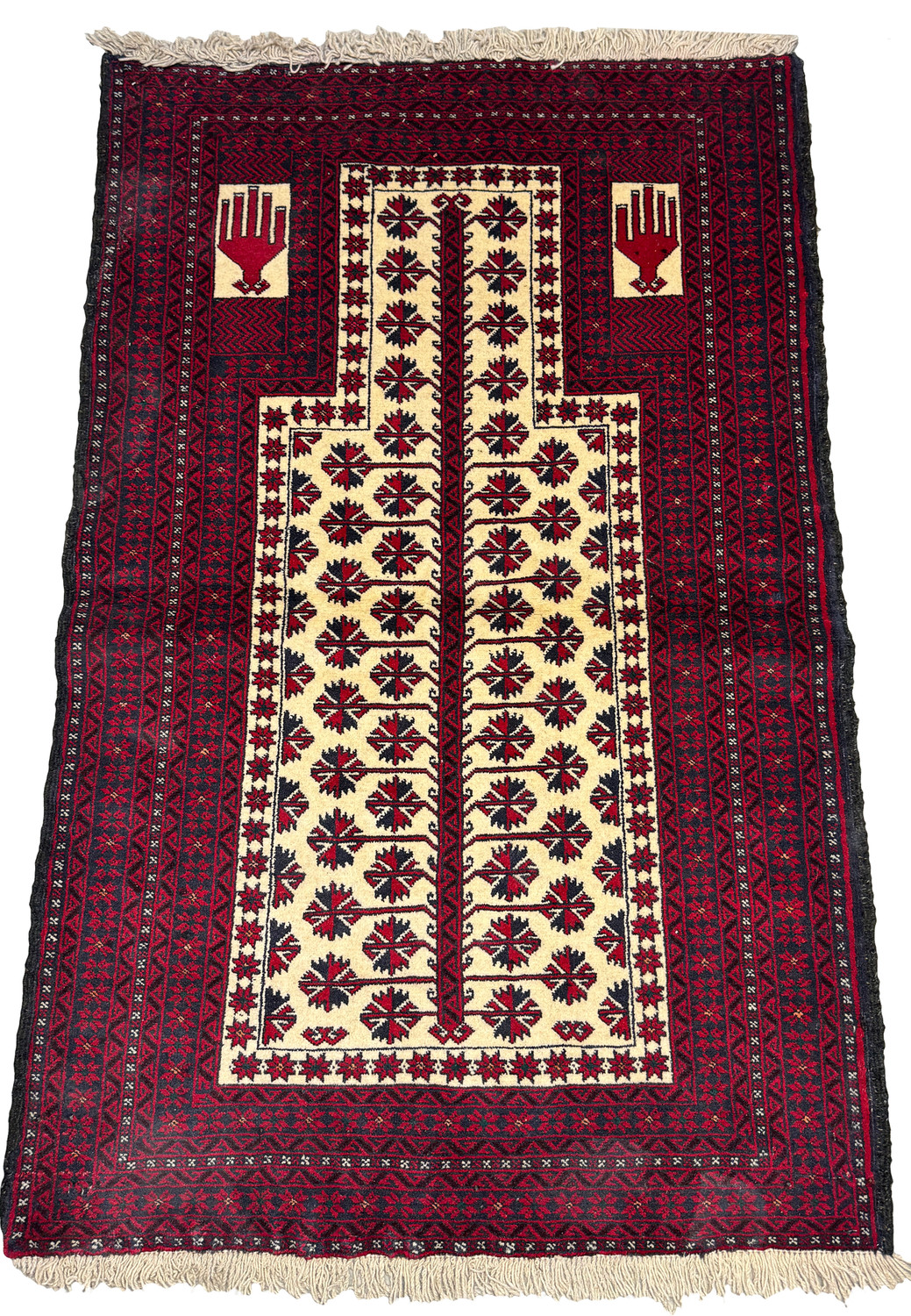 Top view of a Persian Baluch Prayer Rug, highlighting the red mihrab and detailed borders.