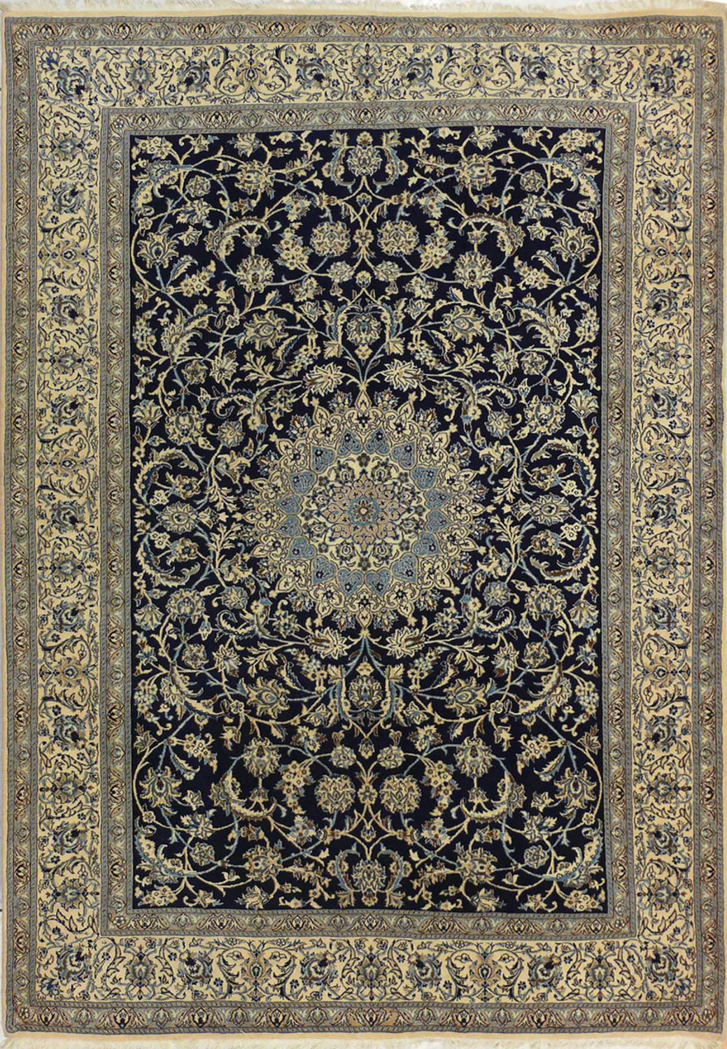 A luxurious Persian 7x10 Nain 9 LAA Wool & Silk Rug with a central medallion and intricate border designs in a rich indigo and cream color palette