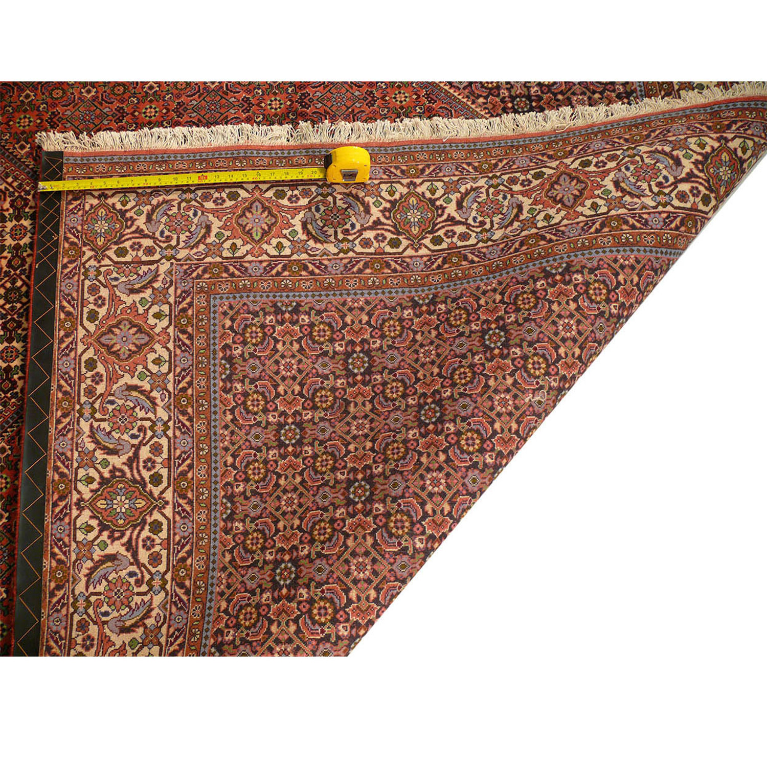 Corner fold of an 8'2" x 11'7" Persian Bijar Rug showcasing its thick pile and tight weave