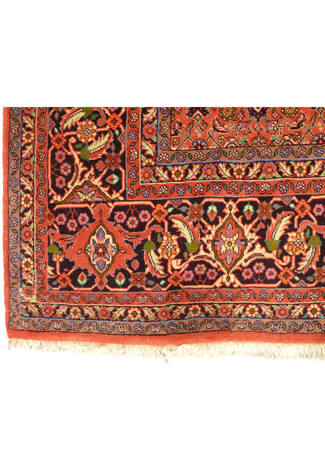 A section of the Persian Bijar Rug, focusing on the detailed pattern and vibrant color palette