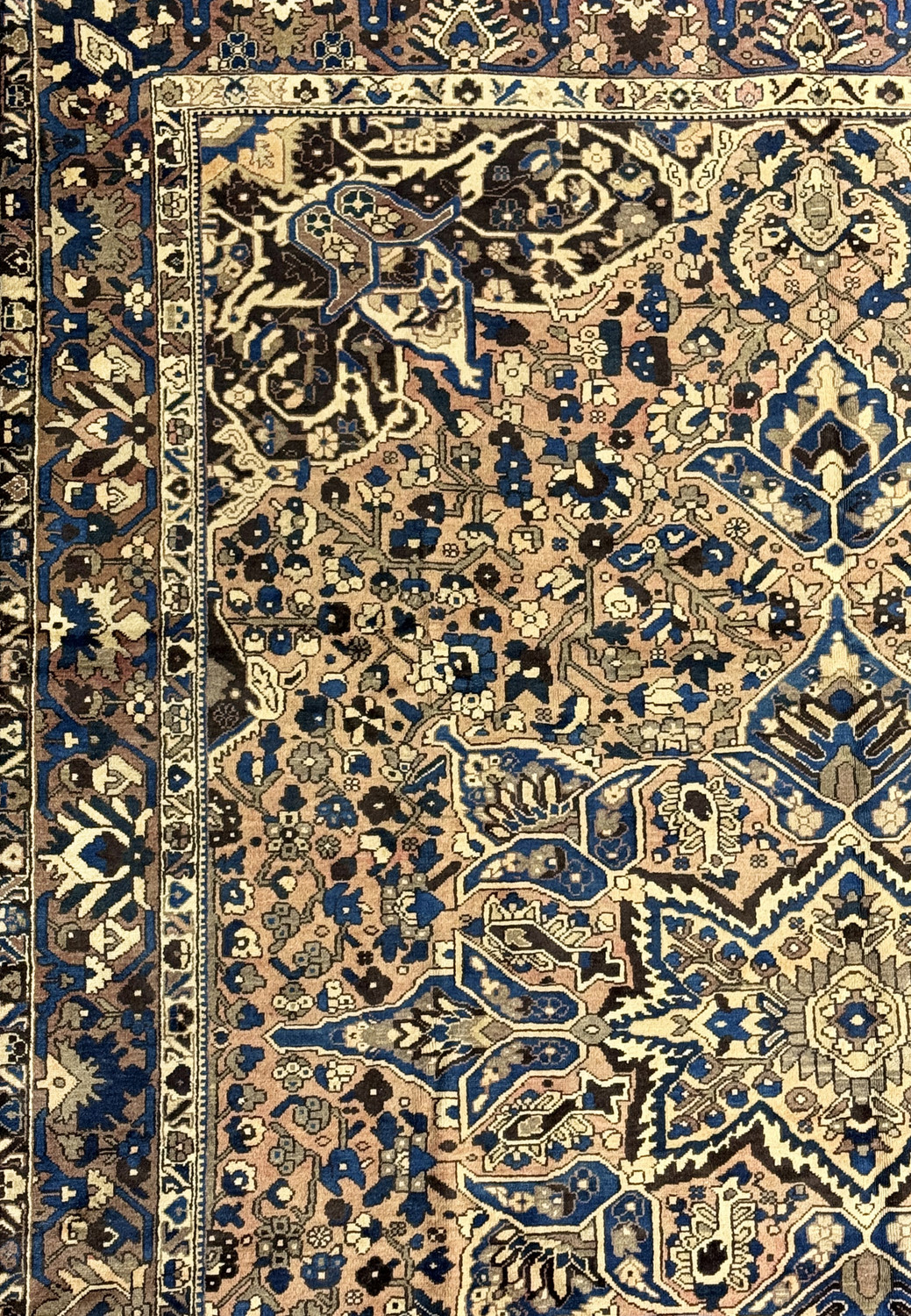 Close-up of the central medallion and surrounding patterns on a Vintage Bakhtiar Rug.