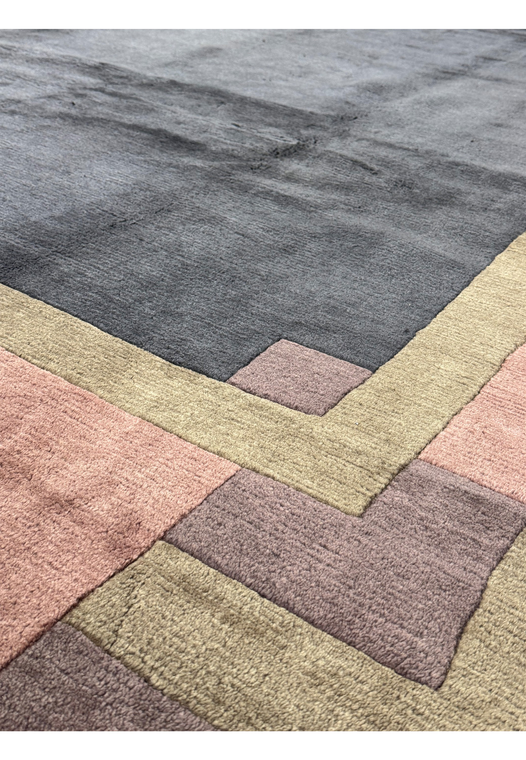 Textured surface of the Modern Tibet Rug in natural light, accentuating the quality weave