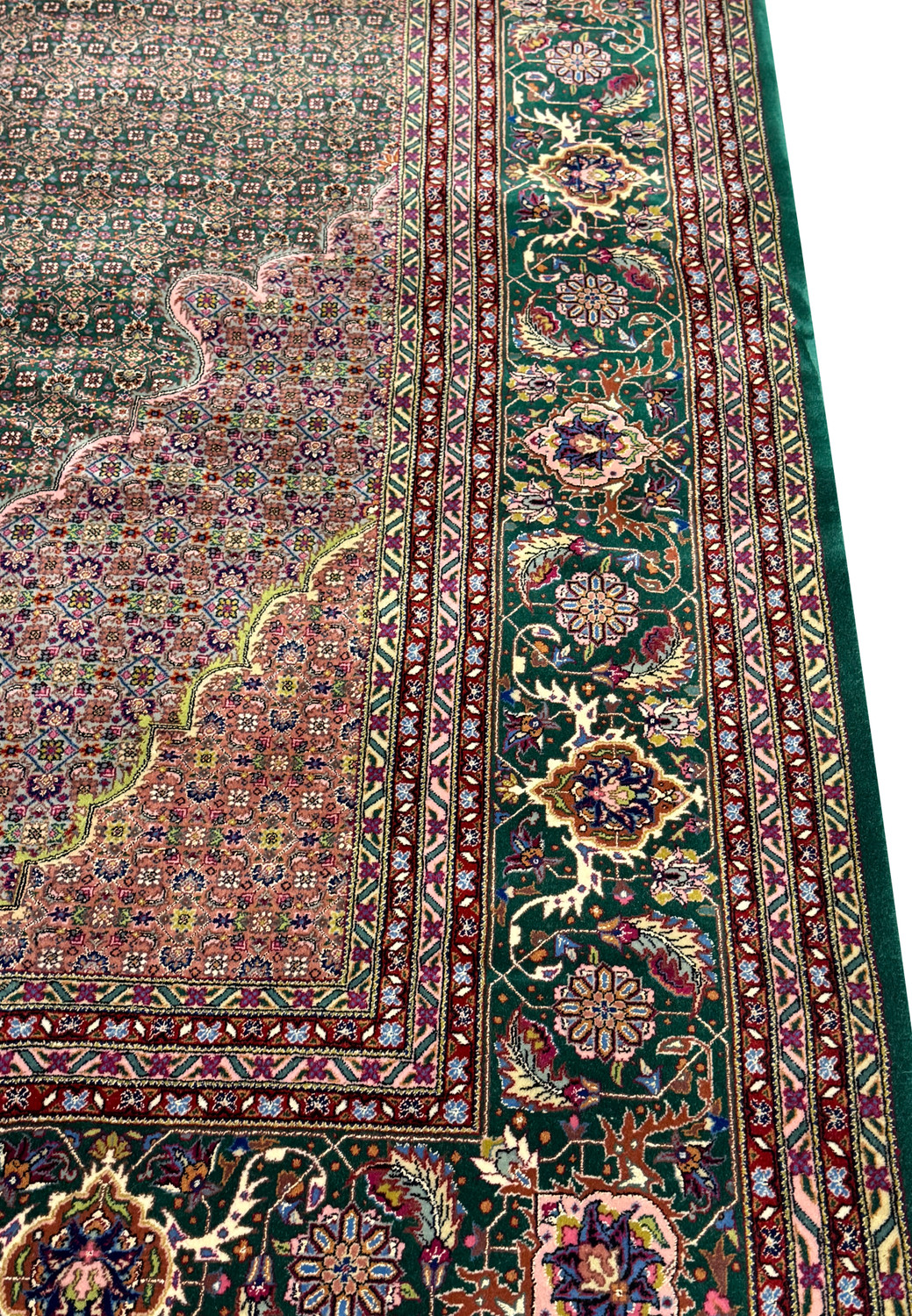 9x12 tabriz Persian Tabriz mahi rugs's border and partial midfield.