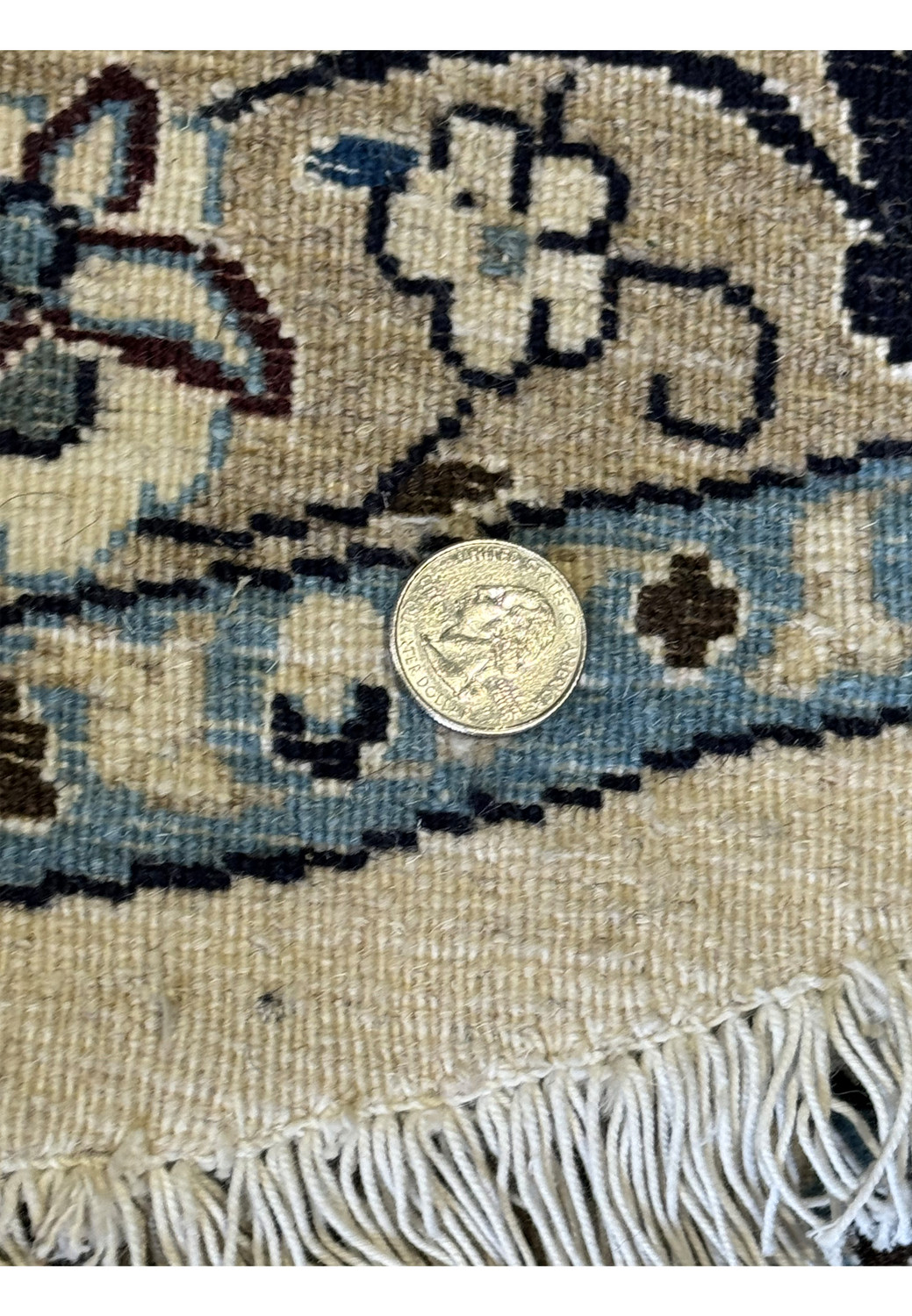 Zoomed-in view of the Persian Nain Round Rug's back demonstrating the fine handwoven knots and quality craftsmanship