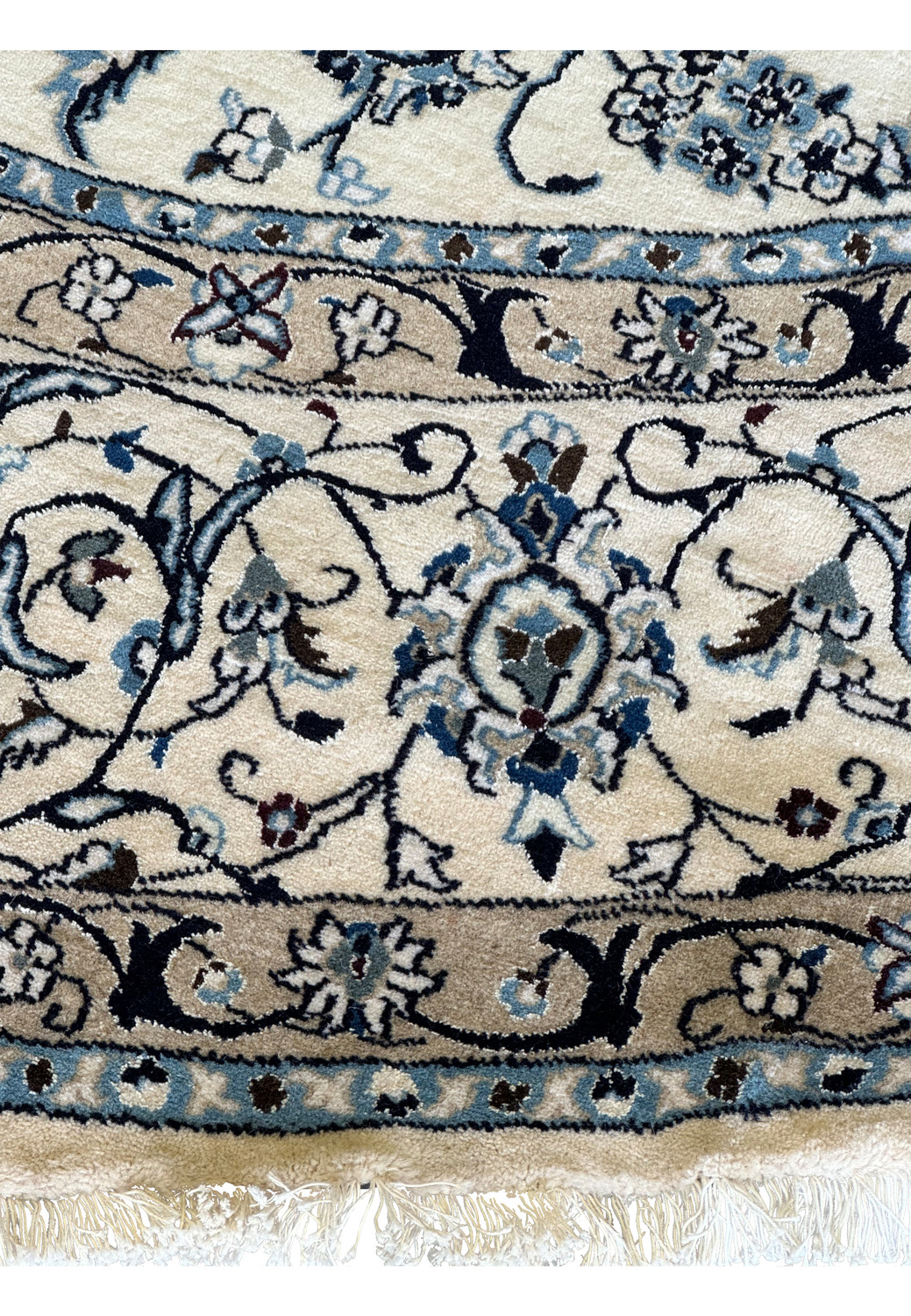 Handmade Persian Nain round rug with elaborate floral and vine motifs