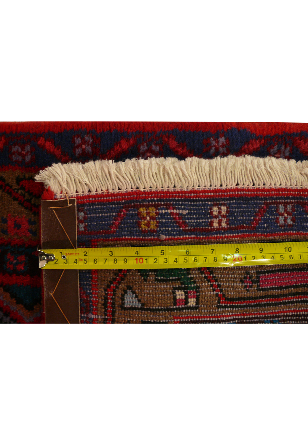 Partial fold-back view of Persian Hamedan Runner Rug revealing the underside weave and authentic hand-knotting