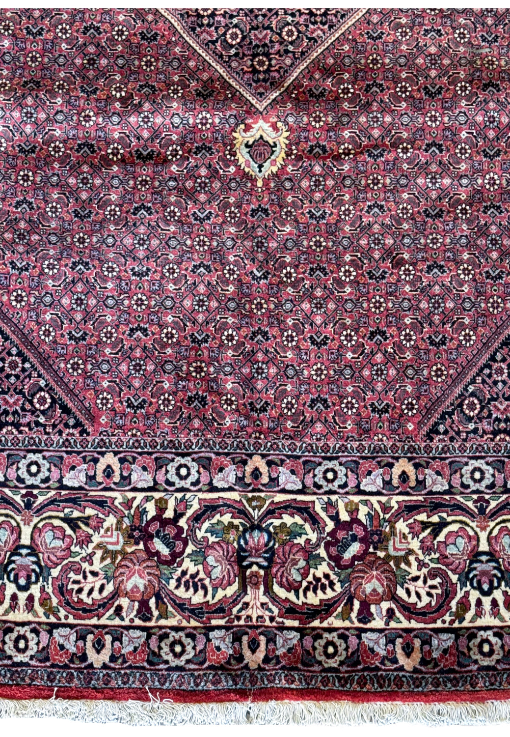 Close-up on the side border of the 11'6x11'6 Persian Bijar square rug, where the detailed floral and geometric motifs showcase the fine craftsmanship.