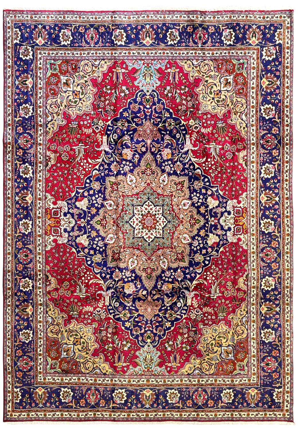 Full display of a Persian Geometric Tabriz Rug, emphasizing the expansive design with a central medallion, detailed borders, and a harmonious blend of red, blue, and cream hues