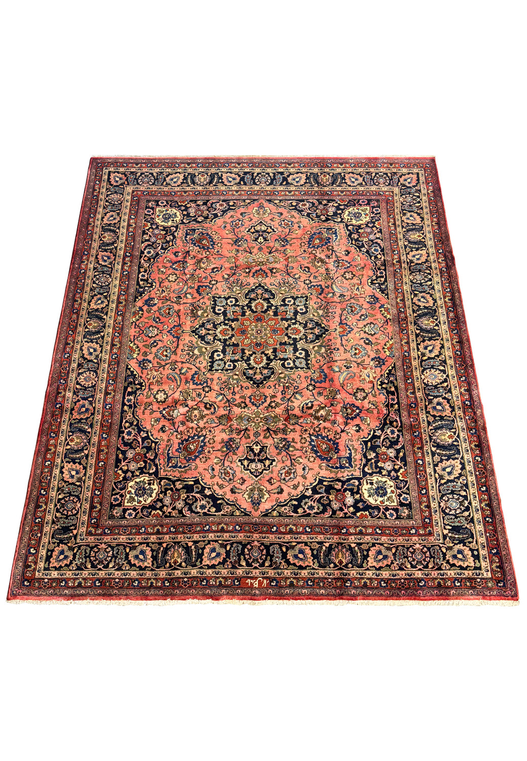 Full view of a Persian Mashad rug laid out flat showcasing the entire pattern and rich color palette