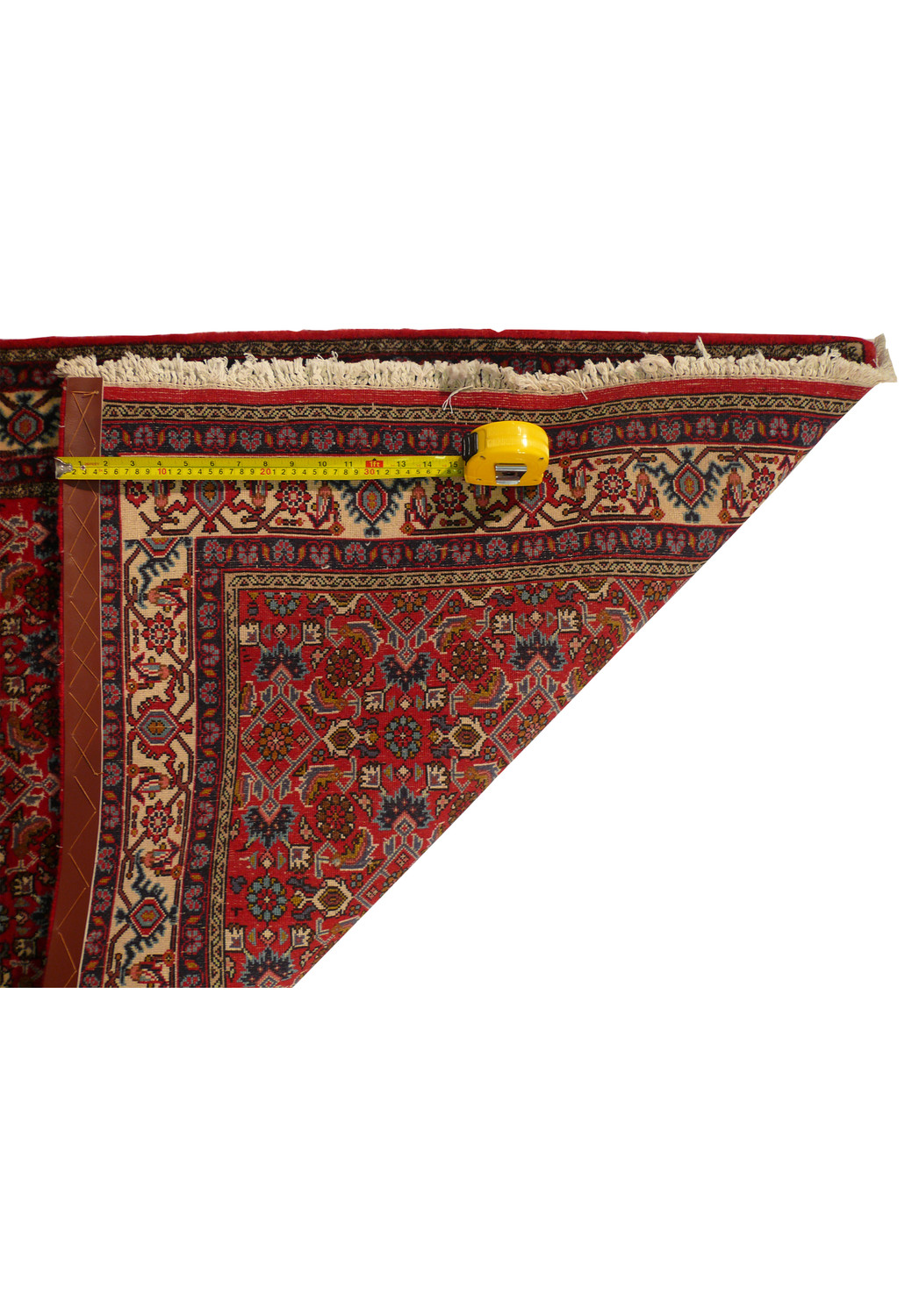 Detailed view of the backside of the Persian Bijar runner rug, showing the dense weave and construction that contribute to its durability. The high-quality wool and tight weaving technique are emphasized.