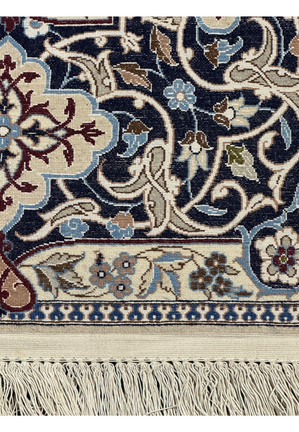 Handwoven details on the 9 x 9 Nain 6LA Persian Rug