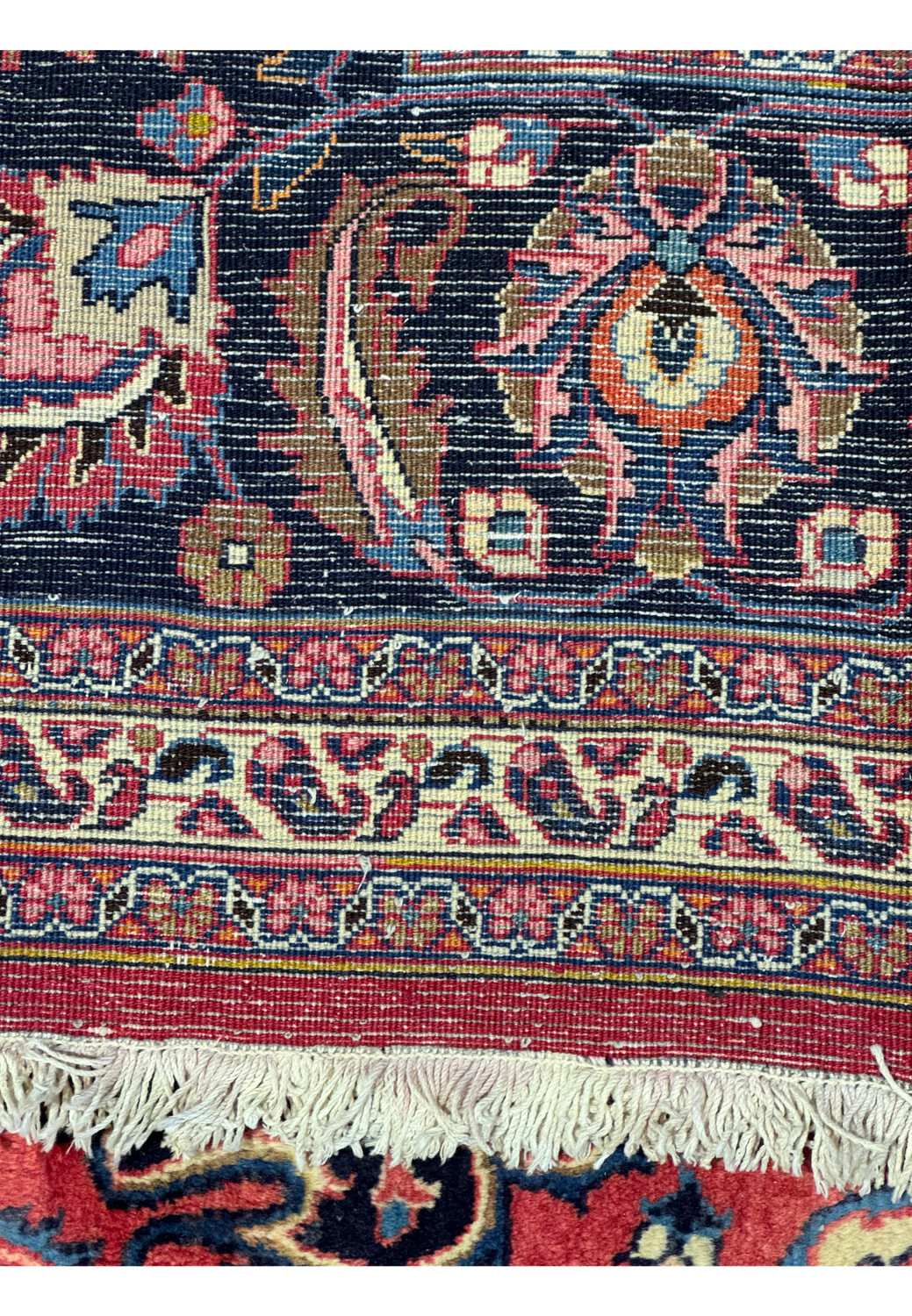 Backside of Persian Mashad Rug Highlighting Hand-Knotted Detail.