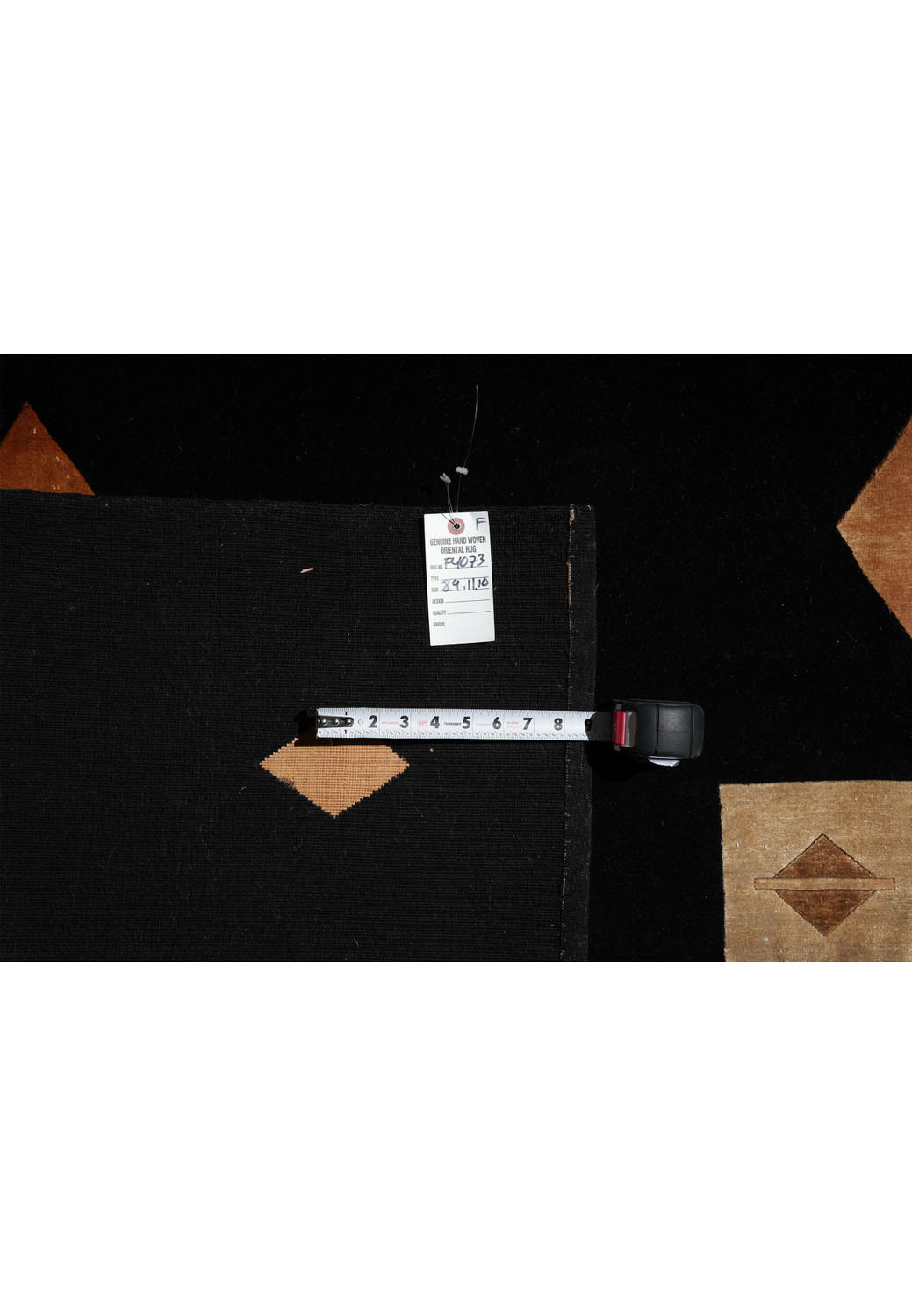 Back of rug showing tight knotting, craftsmanship, and authentic hand-knotted structure