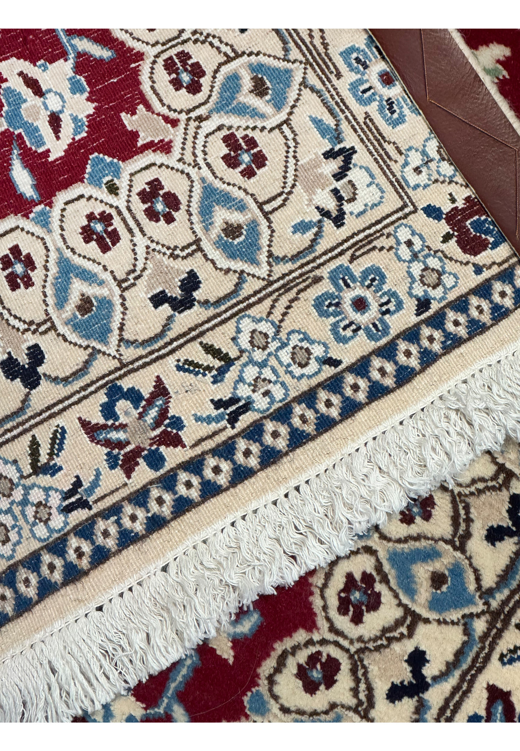 Backside of Persian Nain rug showing fine weave and craftsmanship